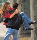 Man carrying the woman he loves